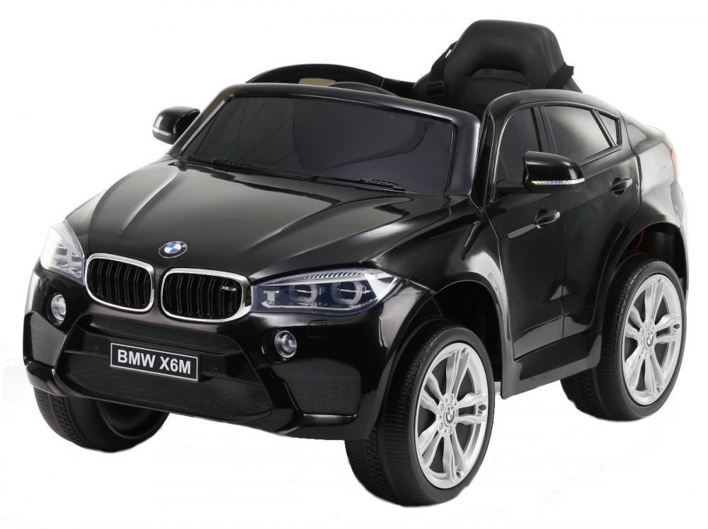 Masinuta electrica cu roti din cauciuc si scaun de piele BMW X6M Black marca BMW cu comanda online