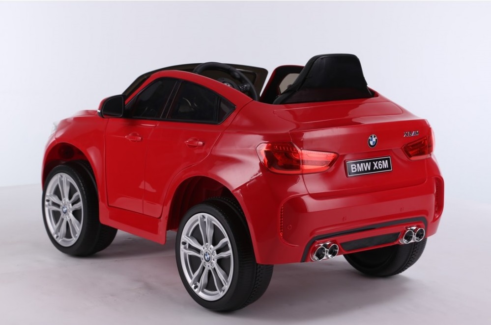 Masinuta electrica cu telecomanda si roti din cauciuc BMW X6M Red marca BMW cu comanda online
